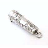 A silver cheroot mouthpiece case with engraved decoration, hallmarked Birmingham 1910, maker Henry