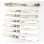 A set of six silver plate mother of pearl handled butter knives, together with another. Approx. 6