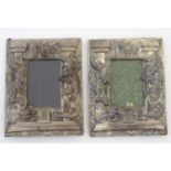A pair of Japanese cast photograph frames with dragon detail in relief. Character marks to tablet.