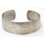 A Canadian silver bangle formed bracelet marked ' Birks Sterling ' Please Note - we do not make