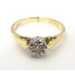 An 18ct gold ring set with diamond solitaire . Ring size approx K Please Note - we do not make