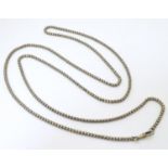 A silver plate longuard chain. Approx. 46" long Please Note - we do not make reference to the