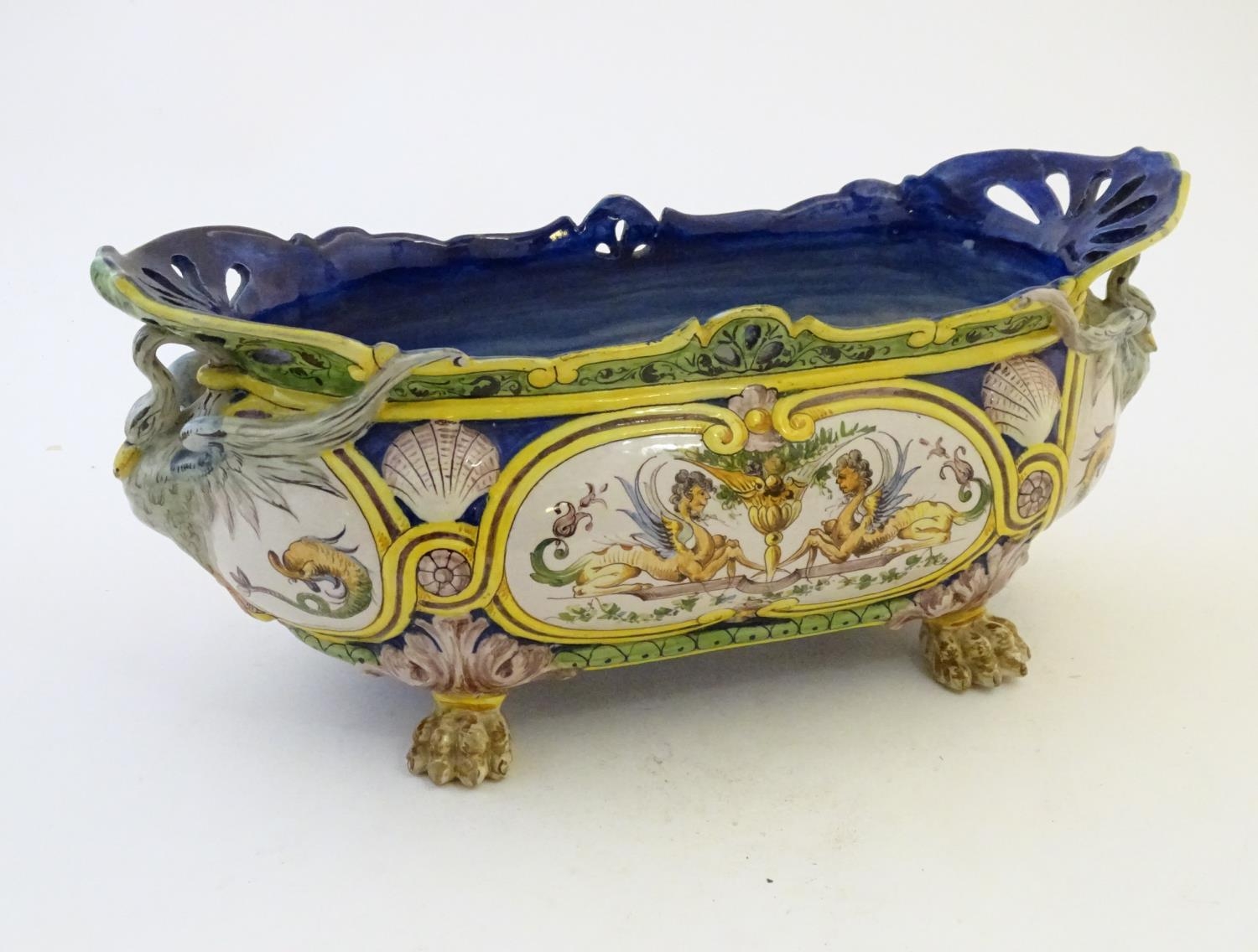 An Italian faience planter of oblong form on claw feet with panelled grotesque decoration - Image 4 of 13