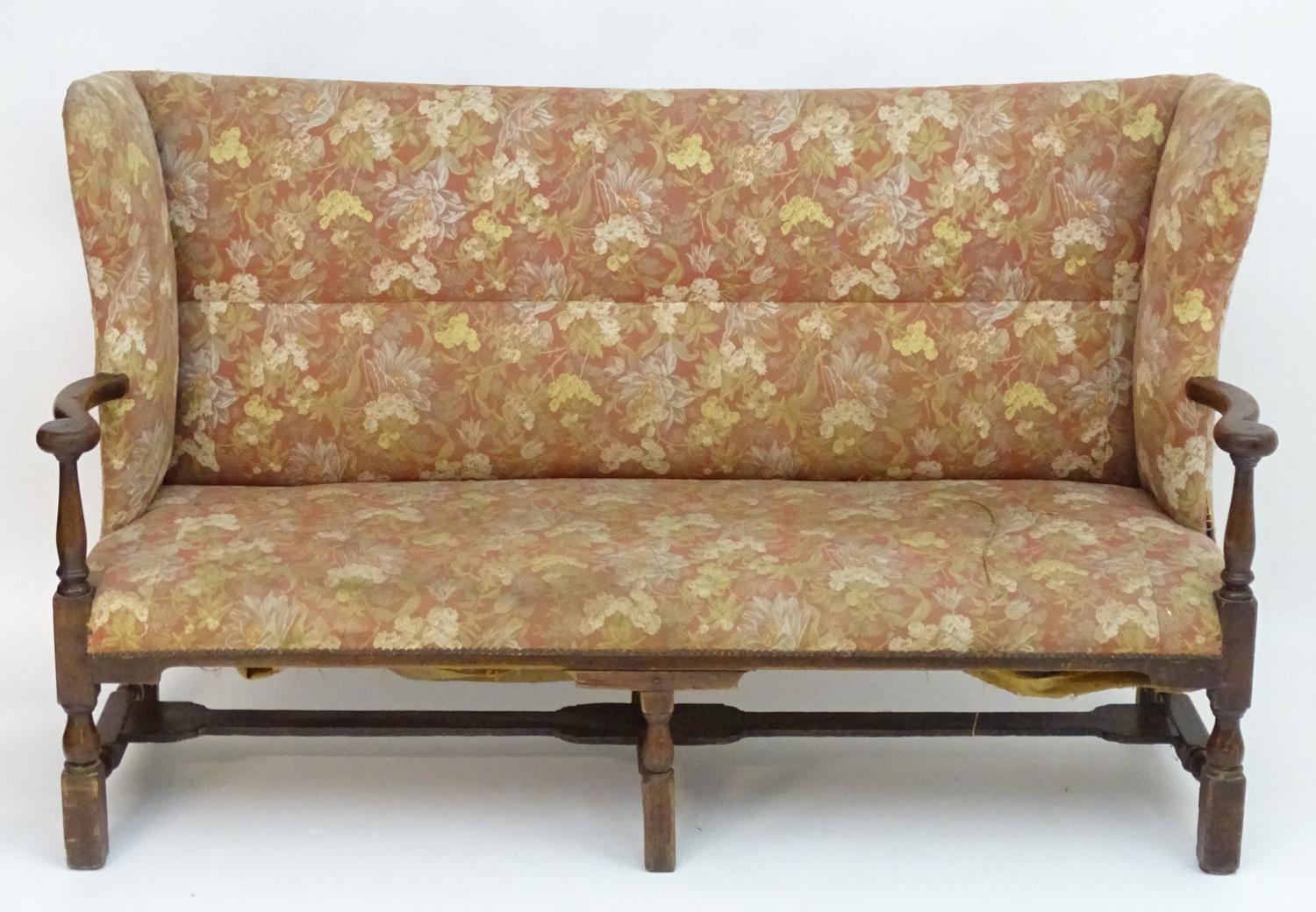 A mid 18thC wingback sofa with scrolled arms and an upholstered backrest and seat above a - Image 3 of 12
