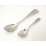 Two silver mustard spoons, one hallmarked London 1887 maker John Aldwinckle & Thomas Slater, the