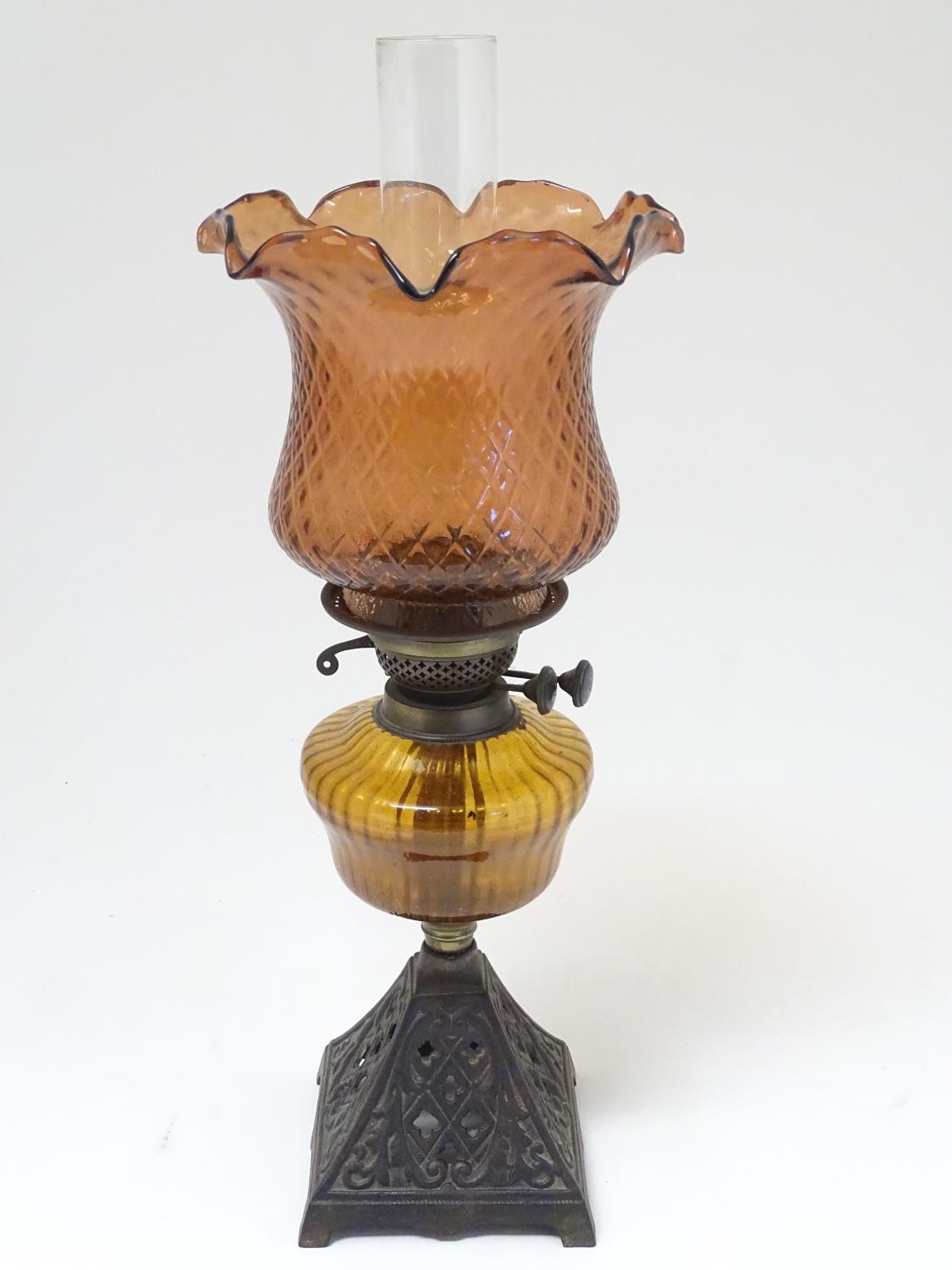 A late 19thC Duplex oil lamp, with bronzed glass shade and reservoir, standing on a cast iron base - Image 12 of 24