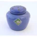 A Royal Doulton pot pourri jar with floral and foliate detail to the body. Marked under with Doulton