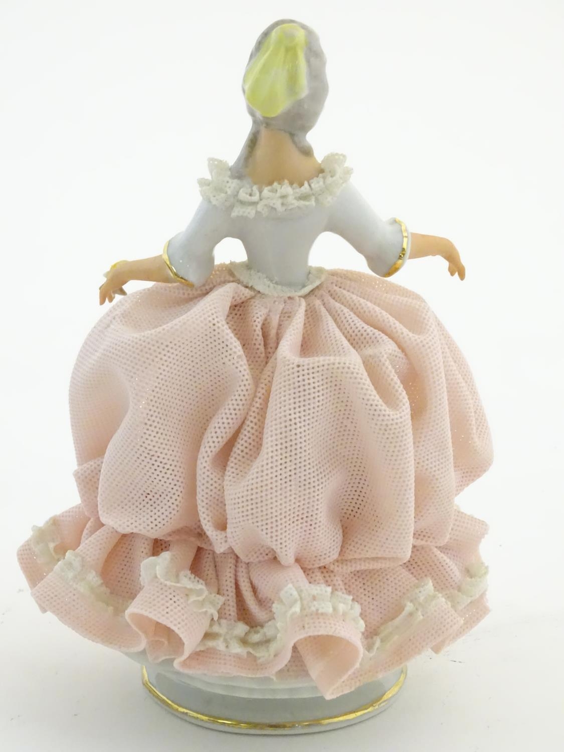 A Dresden model of a lady with a porcelain lace dress. Marked under. Approx. 5 3/4" high Please Note - Image 4 of 6