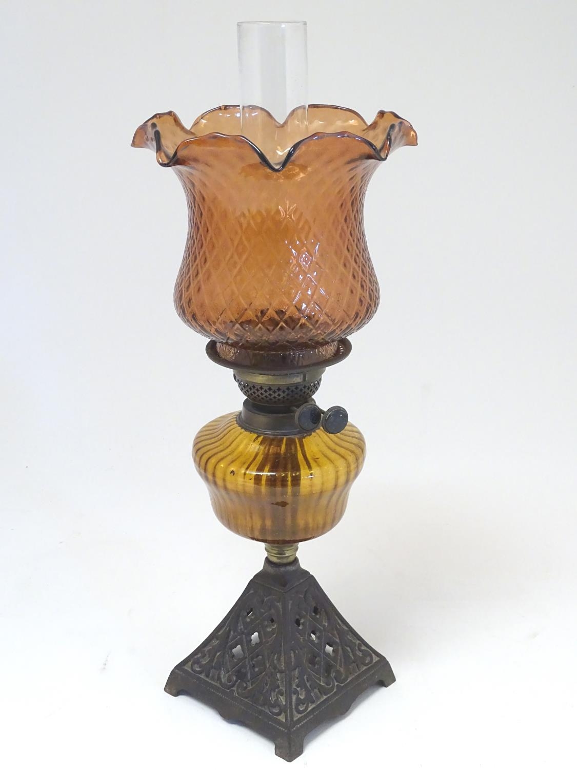 A late 19thC Duplex oil lamp, with bronzed glass shade and reservoir, standing on a cast iron base - Image 5 of 24