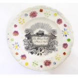 A Victorian nursery plate decorated with a floral border, with the motto The Path of Truth is