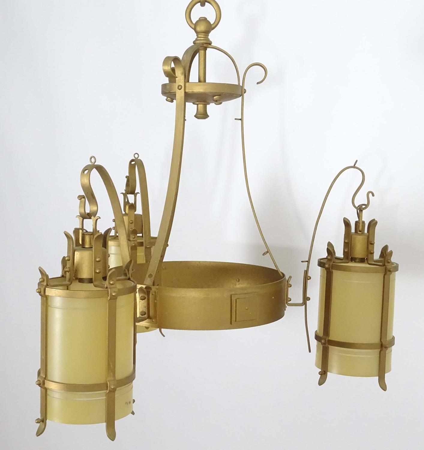 A 20thC Arts & Crafts style pendant gilt ceiling light, with three branches, approximately 24" - Image 18 of 26