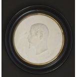 A French 19thC Sevres bisque porcelain / parian ware medallion depicting a profile portrait bust