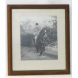 A 20thC monochrome photograph of Winston Churchill on horseback. Approx. 11" x 9 1/4" Please
