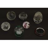 6 Assorted glass paperweights including a Caithness example. The largest 41/4" Please Note - we do