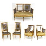 A late 19thC satinwood bergere suite with hand painted frames. Having caned backrests, seats, and