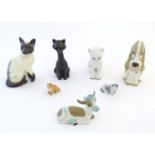 A quantity of assorted ceramic animals to include a Beswick siamese cat, model no. 1882, marked