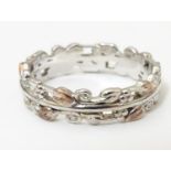 A Welsh Clogau silver ring with gilt highlights to to the foliate band. Ring size approx. S Please
