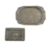 Two Arts & Crafts pewter trays with hammered and embossed decoration. Largest approx. 12" x 18 1/