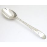 A George III silver Old English pattern teaspoon with bright cut decoration, hallmarked London c.