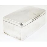 A silver table top cigarette box, hallmarked Birmingham 1905, maker William Neale & Son. Approx.