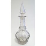 A 19thC glass decanter and stopper 13 1/2" high Please Note - we do not make reference to the