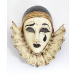 A Venetian Pierrot paper mache mask. Labels within for the Carnevale di Venezia and the workshop