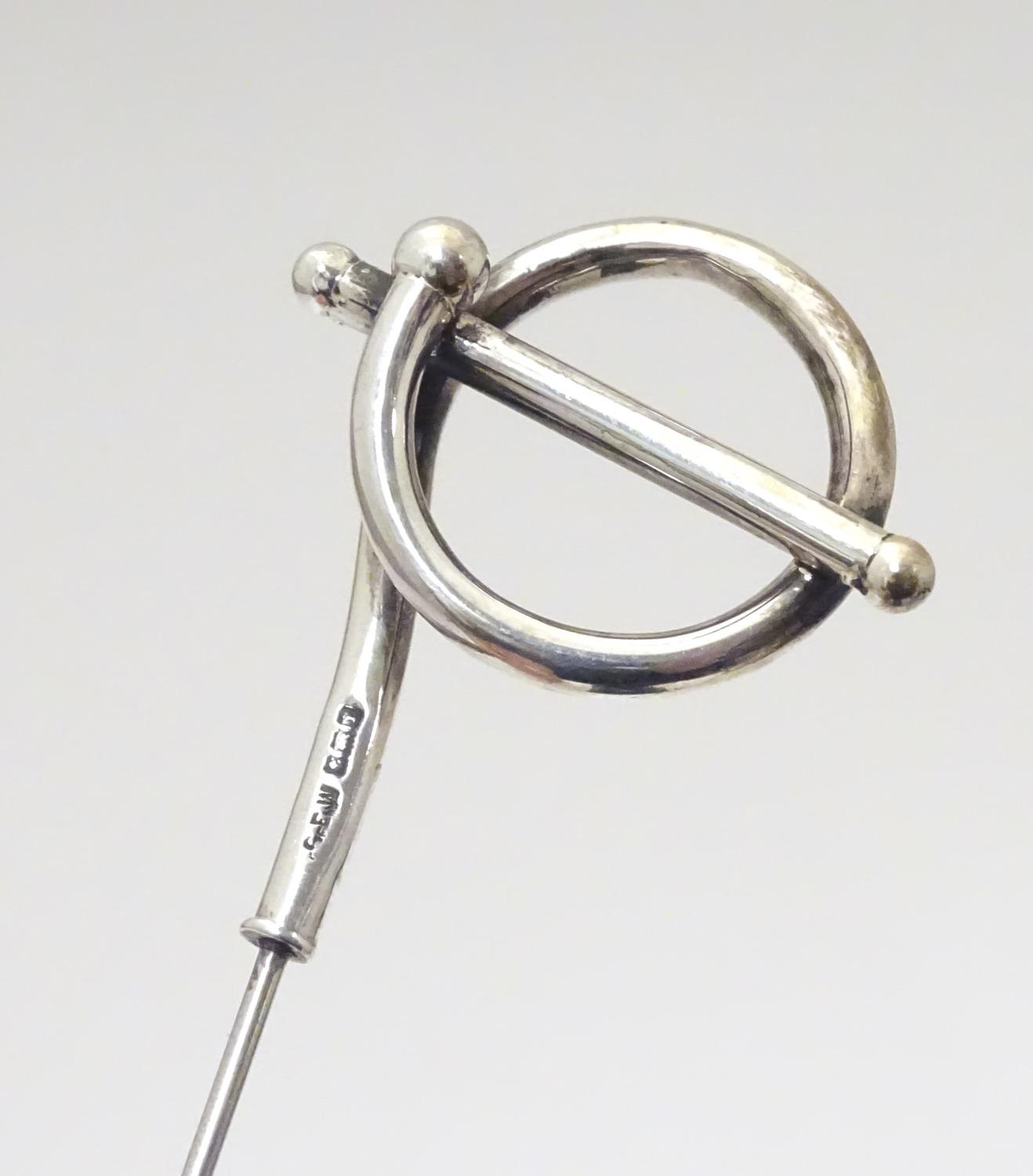 A silver hat pin with scroll decoration hallmarked 1908, maker G. E. Walton & Co. Ltd. Approx. 9 1/ - Image 4 of 8