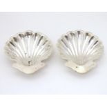 A pair of butter dishes / shells of scallop shell form. Hallmarked Birmingham 1906 maker Elkington &