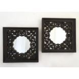 A pair of 20thC mirrors with carved wooden surrounds. Approx. 16" x 16" (2) Please Note - we do