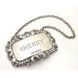 A Victorian silver decanter / wine label / bottle ticket engraved Sherry, hallmarked Sheffield 1985,