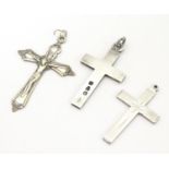 Two silver cross formed pendants, one hallmarked Chester 1895. Together with a silver plate example.