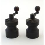 A pair of mid 20thC cast iron table salt & pepper grinders, in the style of the Robert Welch '