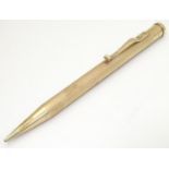 A 9ct gold Yard - O - Led pencil with engine turned decoration. marked Patent 422767 and