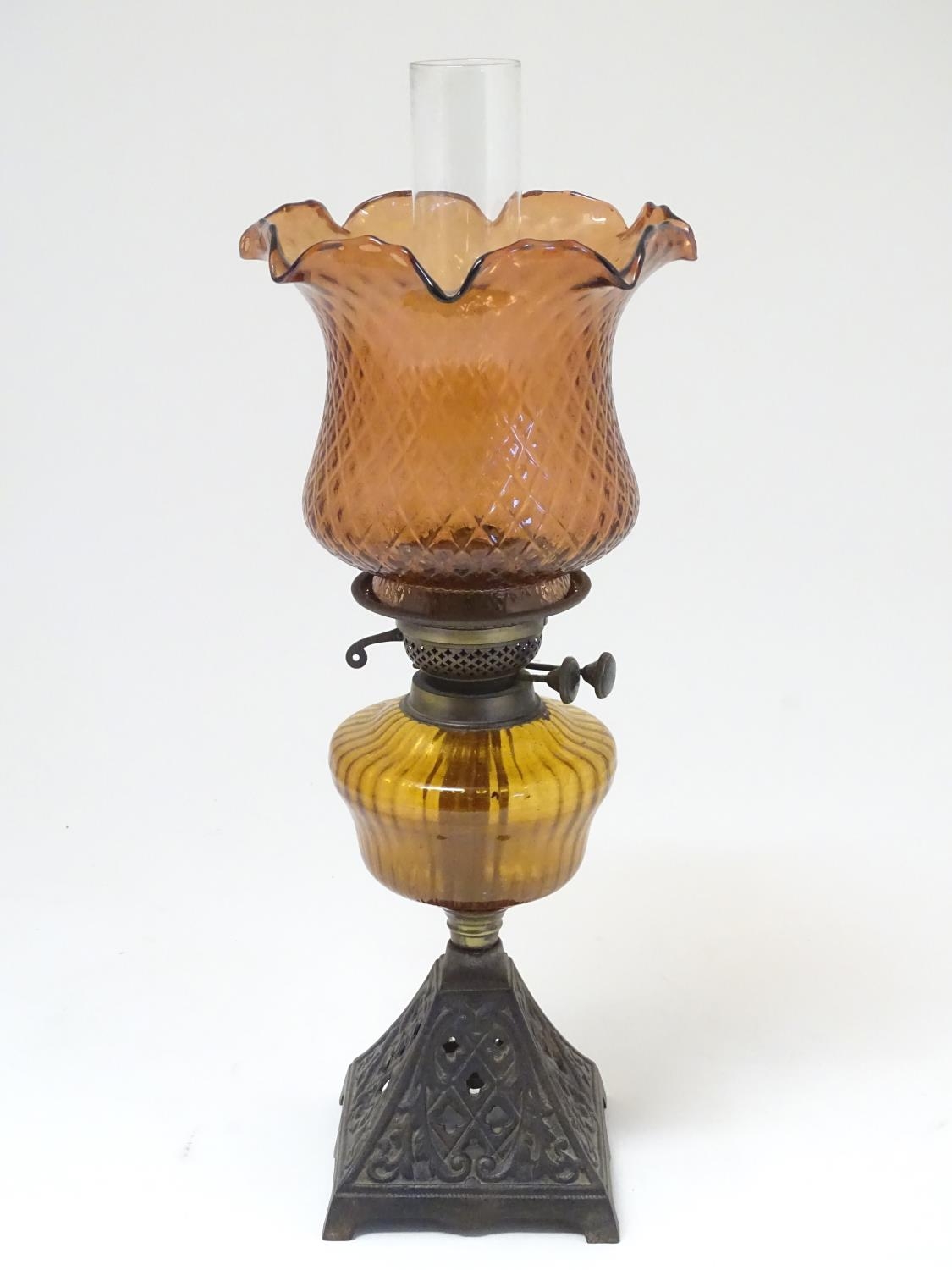 A late 19thC Duplex oil lamp, with bronzed glass shade and reservoir, standing on a cast iron base - Image 9 of 24