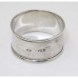 A silver napkin ring, hallmarked Chester 1916, maker Charles Horner Ltd. Please Note - we do not