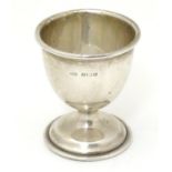 A silver egg cup, hallmarked Birmingham 1956, maker B & Co. Approx. 2 1/4" high Please Note - we