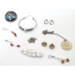 Assorted jewellery to include silver earrings, pendants, brooch, etc. Please Note - we do not make