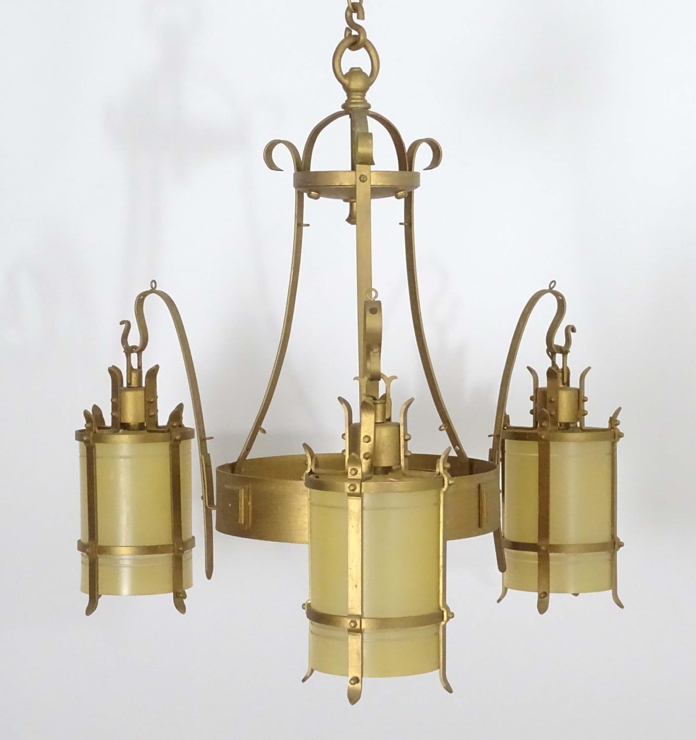 A 20thC Arts & Crafts style pendant gilt ceiling light, with three branches, approximately 24" - Image 16 of 26