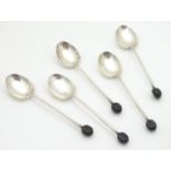A set of 5 silver coffee spoons with bean decoration to handles. Hallmarked Birmingham 1922 by