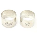 Two silver napkin rings, one hallmarked London 1918, maker Edward Barnard & Sons Ltd., the other