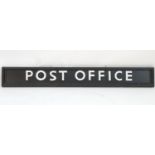 A 20thC wooden Post Office sign with monochrome painted lettering. Approx. 8" x 61 3/4" Please