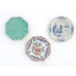 Three assorted Oriental plates, comprising a blue and white plate decorated with a seascape scene