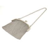 A silver bag with chain mesh body, hallmarked London 1915, maker Cornelius Desormeaux Saunders &