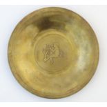 A Scandinavian cast metal dish with central Pan figure playing his flute. Marked Danica Bronce