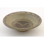 A Peter Arnold, Alderney studio pottery stoneware bowl. Marked to rim of base. Approx. 8 1/2"