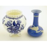 A Dudson Brothers jasperware style vase with bird and bamboo decoration. Together with a blue and