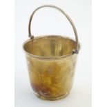 A 20thC James Dixon & Sons silver plated ice bucket, with swing handle and plunger lid, 5 1/2"