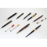 A quantity of mid 20th pens and propelling pencils, including a King George V and Queen Mary 1910-