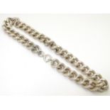 A silver and white metal necklace of choker form. Approx. 14" long Please Note - we do not make