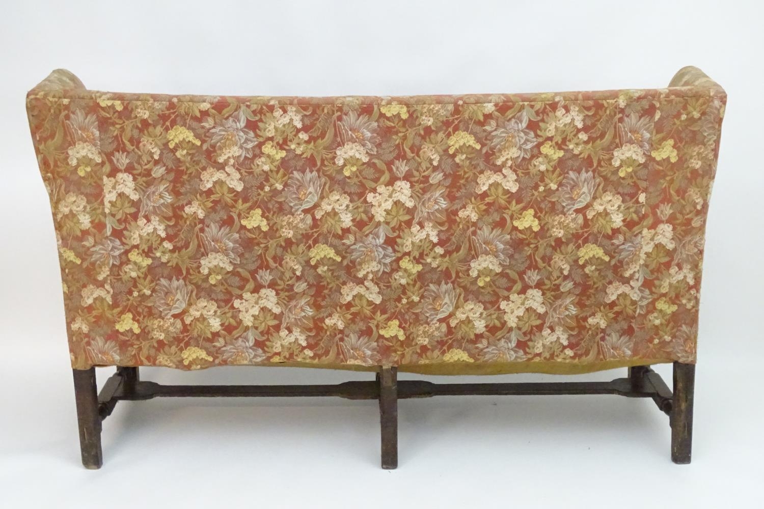 A mid 18thC wingback sofa with scrolled arms and an upholstered backrest and seat above a - Image 11 of 12